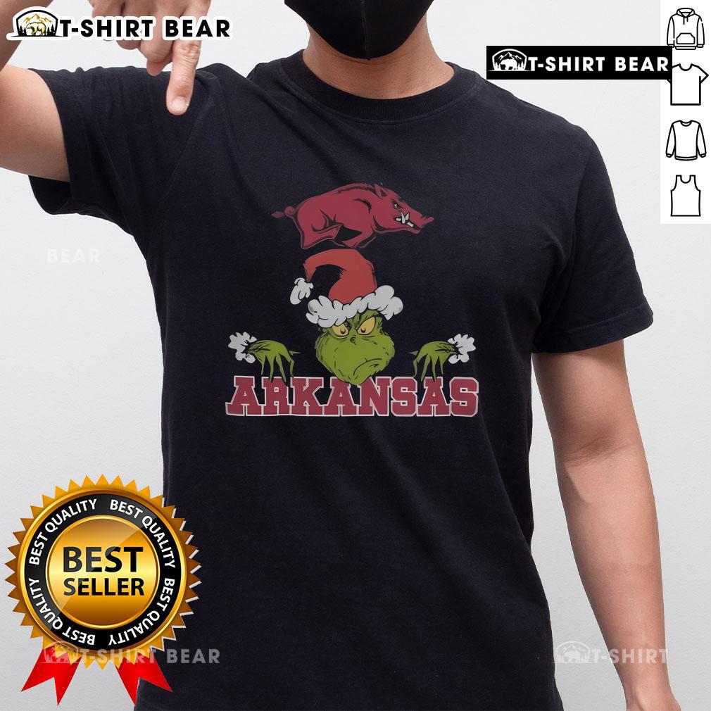 Top Grinch Ncaa Arkansas Razorbacks Logo Football Christmas 2024 T Shirt Top Grinch NCAA Arkansas Razorbacks logo football Christmas 2024 T-shirt featuring festive design for fans.
