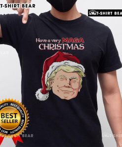 Top Have A Very Maga Christmas T-Shirt featuring festive graphics and bold text for holiday celebrations.