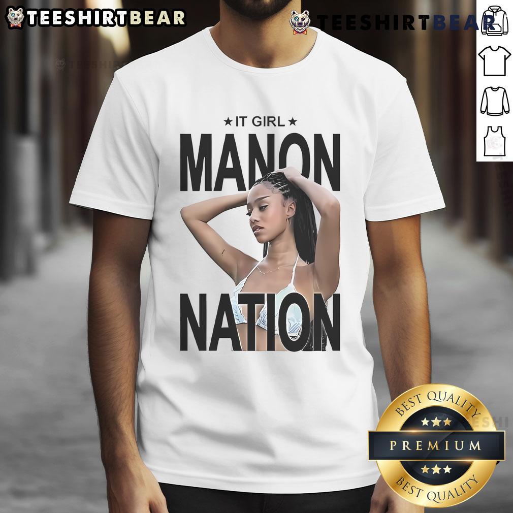 Top It Girl Manon Nation T Shirt Top It Girl Manon Nation T-Shirt displayed on a mannequin, showcasing trendy fashion and vibrant design.