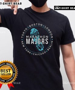 Runner wearing a Top Marathon Majors Finisher T-Shirt after completing 26 miles in a marathon race.