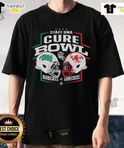 Top Ohio Bobcats vs Jacksonville State Gamecocks 2024 Staff DNA Cure Bowl T-Shirt design showcasing team logos and colors.