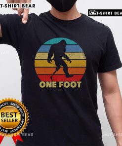 Vintage sunset t-shirt featuring Bigfoot prosthetics for amputated disability, celebrating uniqueness and strength.