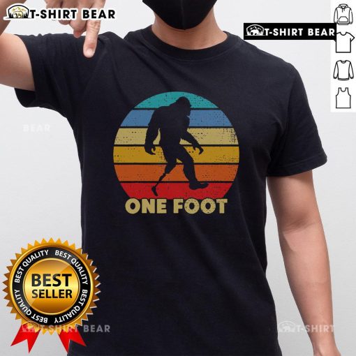 Vintage sunset t-shirt featuring Bigfoot prosthetics for amputated disability, celebrating uniqueness and strength.