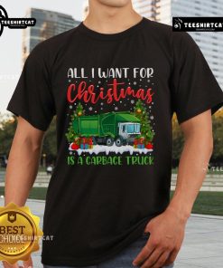 Top Xmas lighting featuring 'All I Want For Christmas Is A Garbage Truck' T-shirt design in festive colors.