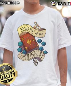Awesome Beware Of The Smiling Dungeon Master T-Shirt featuring a whimsical design perfect for tabletop gaming enthusiasts.