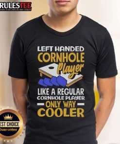 Alt Text: Awesome left-handed cornhole player wearing a cool t-shirt, showcasing skill and style in a vibrant outdoor setting.