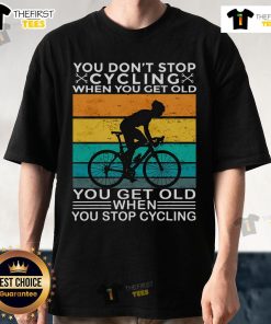 Vintage bike riding t-shirt with 'You Don't Stop Cycling When You Get Old' slogan, perfect for cycling enthusiasts.