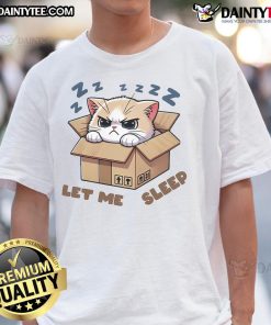 Adorable angry sleepy cat graphic on a 'Let Me Sleep' T-shirt, perfect for cat lovers and cozy casual wear.