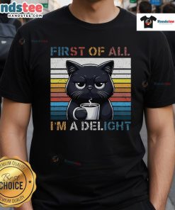 Funny cat graphic on a sarcastic t-shirt reading 'First Of All I'M A Delight' in vibrant colors.