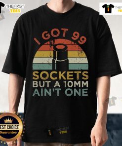 Funny mechanic t-shirt featuring 'I Got 99 Sockets But A 10Mm Ain't One' design for auto repair enthusiasts.
