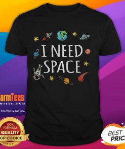 Funny 'I Need Space' astronaut t-shirt showcasing a playful space theme with a cartoon astronaut in a colorful design.