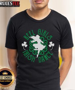 Funny Irish step dancer in colorful t-shirt performing a lively step dancing reel at an Irish dance event.