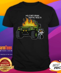Alt Text: Funny military grade mental health raccoon graphic on a burning truck t-shirt, perfect for quirky fashion lovers.