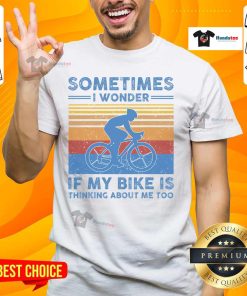 Alt Text: Vintage T-shirt with 'Sometimes I Wonder If My Bike Is Thinking About Me Too' print, perfect for bike lovers.