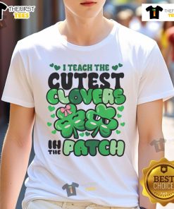 Funny St. Patrick's Day teacher t-shirt featuring cute clovers design, perfect for festive classroom celebrations.