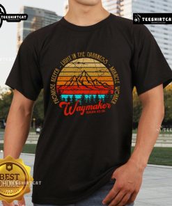 Vintage sunset T-shirt featuring 'Good Waymaker Isaiah 42:16' design, symbolizing promise keeping and light in darkness.