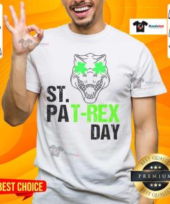 Happy St Patrex Day Dino St Patrick's Day T-Shirt featuring a cheerful dinosaur in festive green attire.