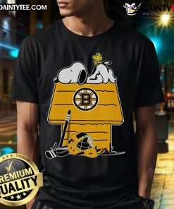 Alt Text: Hot Boston Bruins NHL Hockey Snoopy Woodstock Peanuts Movie T-Shirt featuring vibrant graphic design for fans.