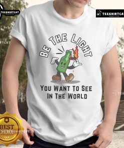 Nice Be The Light You Want To See In The World T-Shirt featuring a motivational quote in vibrant typography.