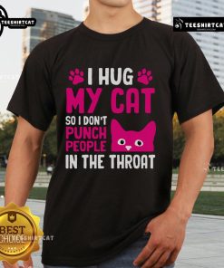 Funny 'Hug My Cat So I Dont Punch People' T-Shirt design featuring a playful cat graphic and humorous text.