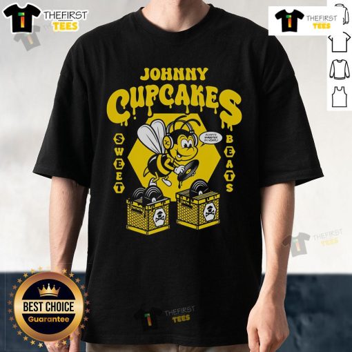 Alt Text: Official Johnny Cupcakes Sweet Beats Vinyl T-Shirt featuring vibrant graphics and a stylish design for music lovers.