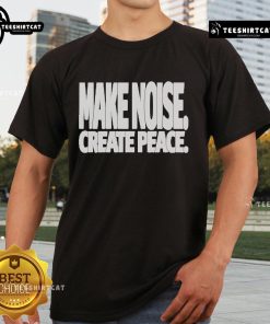 Official Make Noise Create Peace T-Shirt featuring a vibrant design promoting peace and creativity in stylish apparel.