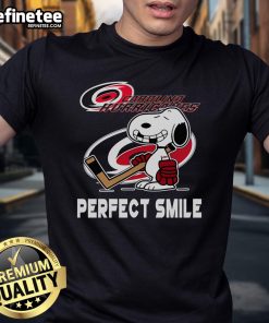 Official NHL Carolina Hurricanes Snoopy Perfect Smile T-Shirt featuring Peanuts Movie design for hockey fans.