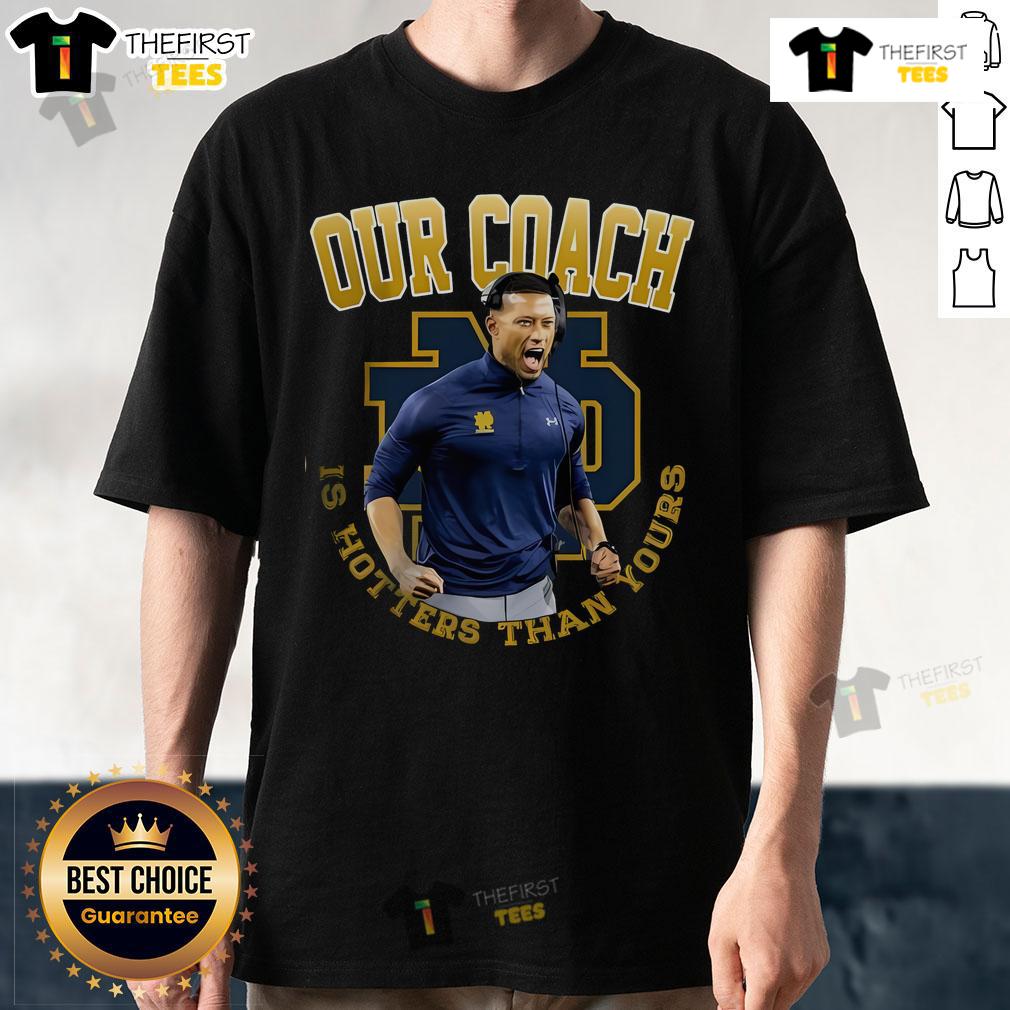 Official Notre Dame Fighting Irish Our Coach Is Hotter Than Yours Marcus Freeman T-Shirt Alt Text: Notre Dame Fighting Irish Marcus Freeman T-Shirt featuring 'Our Coach Is Hotter Than Yours' slogan.