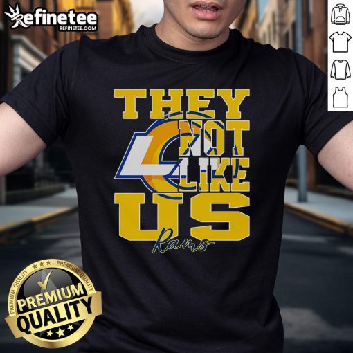 Official They Not Like Us Los Angeles Rams NFL football t-shirt featuring team colors and logo, perfect for fans.