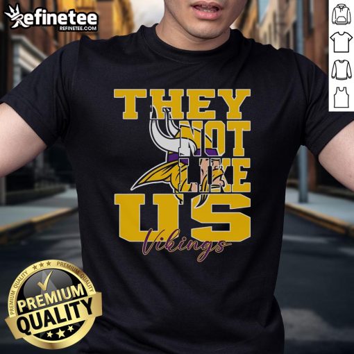 Official They Not Like Us Minnesota Vikings NFL football T-shirt featuring bold team graphics and vibrant colors.