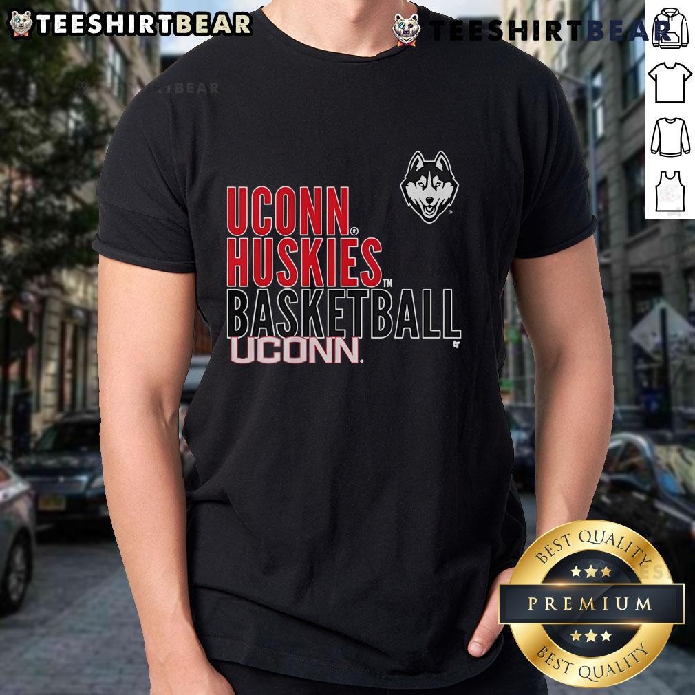 Official Uconn Huskies Basketball Text Logo Overlay T Shirt Official UConn Huskies basketball text logo overlay t-shirt featuring bold graphics and school colors for fans.