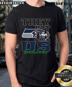Original They Not Like Us Seattle Seahawks NFL football T-shirt featuring bold team graphics and vibrant colors.
