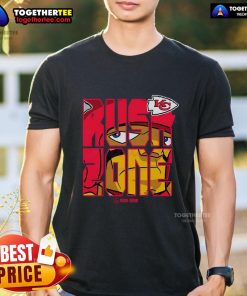 Cartoon Kansas City Chiefs football logo on a stylish NFL Rush Zone t-shirt, perfect for fans and game day attire.
