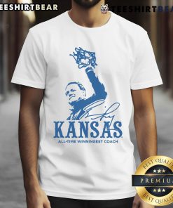 Alt Text: Bill Self Kansas Jayhawks Ash Rally T-Shirt celebrating the winningest coach in basketball history.