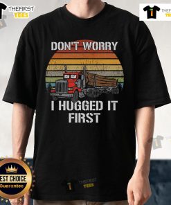Retro 'Dont Worry I Hugged It First' Log Truck Driver T-Shirt featuring a playful design for truck enthusiasts.