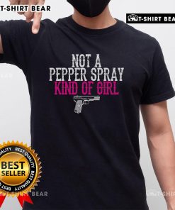 Top Not A Pepper Spray Girl Pro Gun Second Amendment T-Shirt featuring bold graphic design and empowering message.