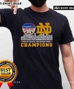 Alt Text: Notre Dame Fighting Irish T-Shirt celebrating 2024-25 Capital One Orange Bowl Champions with a vibrant skyline design.