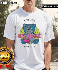 Top Stay Classic Never Settle Teddy T-Shirt in vibrant colors, perfect for casual wear and expressing your unique style.