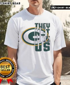 Top They Not Like Us Green Bay Packers logo football t-shirt featuring vibrant colors and team branding for fans.