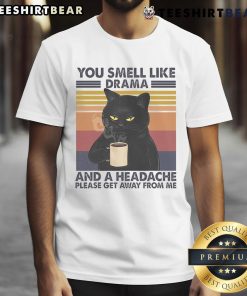 Alt Text: Funny 'You Smell Like Drama And A Headache' coffee cat t-shirt design featuring a playful cat graphic and bold text.