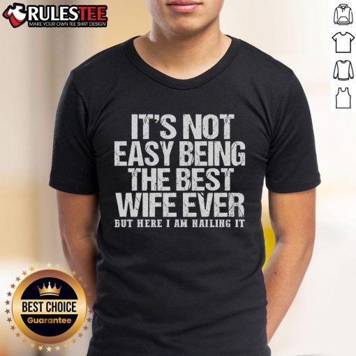 Awesome 'It's Not Easy Being The Best Wife Ever But Here I Am Nailing It' T-Shirt design featuring bold text on a stylish tee.