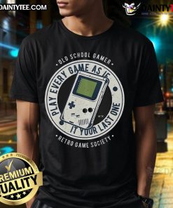 Awesome old school gamer wearing a retro T-shirt that says 'Play Every Game As If It's Your Last One' in vibrant colors.
