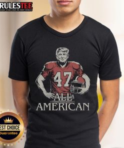 Awesome Trump All American Football T-Shirt featuring bold graphics and patriotic colors, perfect for sports fans.