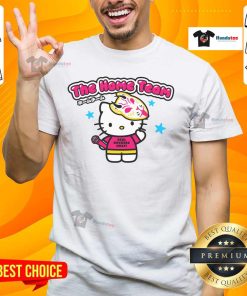 Alt Text: Cute Hello Kitty cat graphic on 'The Home Team Real Rockers Only' T-shirt for stylish fans and cat lovers.