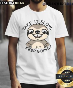 Alt Text: Cute sloth graphic on a 'Take It Slow But Keep Going' T-shirt, perfect for relaxed, motivational style.