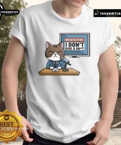 Funny Breaking News I Don't Give A Shit Angry Cat T-Shirt featuring a humorous cat graphic and bold text design.