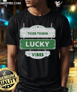 Funny green St. Patrick's Day T-shirt featuring thick thighs and lucky vibes design for festive celebrations.