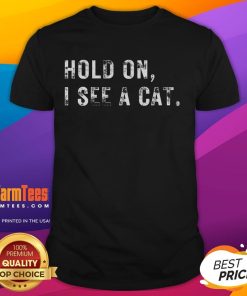 Funny Hold On I See A Cat T-Shirt for cat lovers featuring a playful cat graphic and humorous text design.