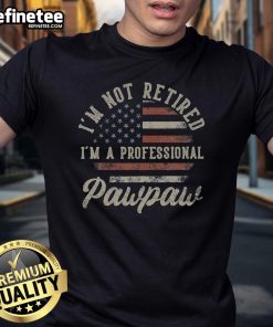 Alt Text: Funny I'm Not Retired I'm A Professional Pawpaw retirement t-shirt design featuring playful text and graphics.