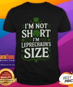 Funny St Patrick's Day T-shirt saying 'I'm Not Short, I'm Leprechaun Size' with vibrant green graphics and playful font.